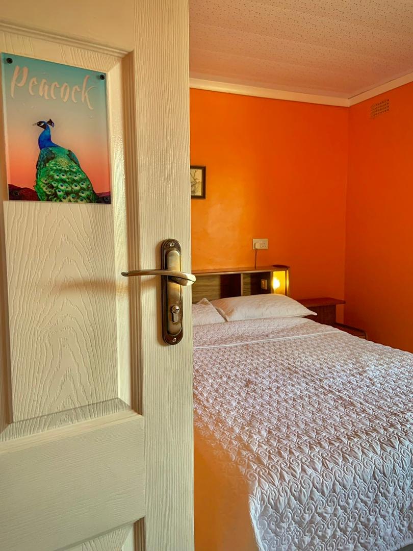 Peacock room door and bedroom